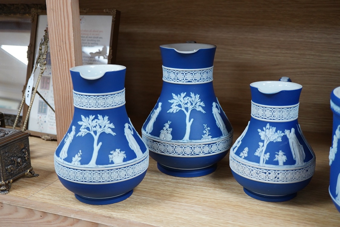 Three 19th century Wedgwood graduated jasper ware jugs and a jardiniere- 16.5cm